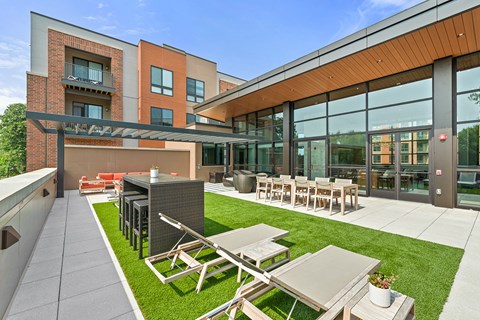 Exton apartment roof-top lounge with fire pits at Keva Flats